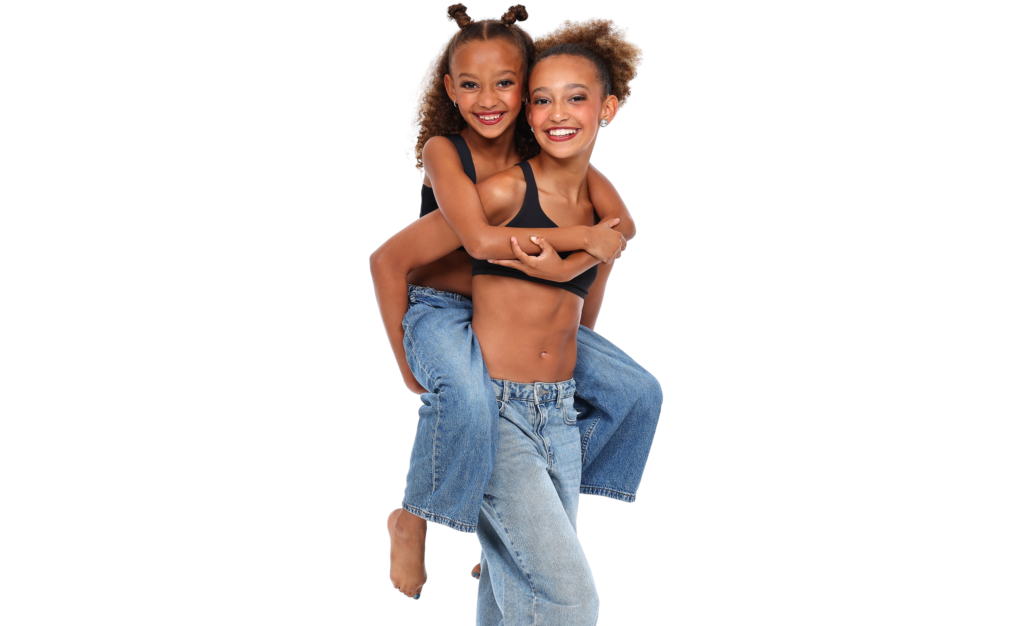 photos of sisters doing a piggy back ride